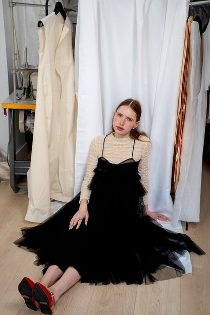 ALEX S. YU Georgia tulle dress in black featuring a voluminous, tiered silhouette and sheer ruffled layers.
