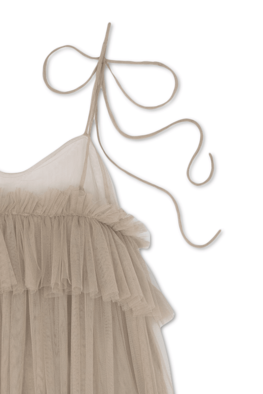 Close Up view of the Beige Georgia Dress, a tiered ruffled tulle A-line dress by Vancouver label ALEX S. YU.